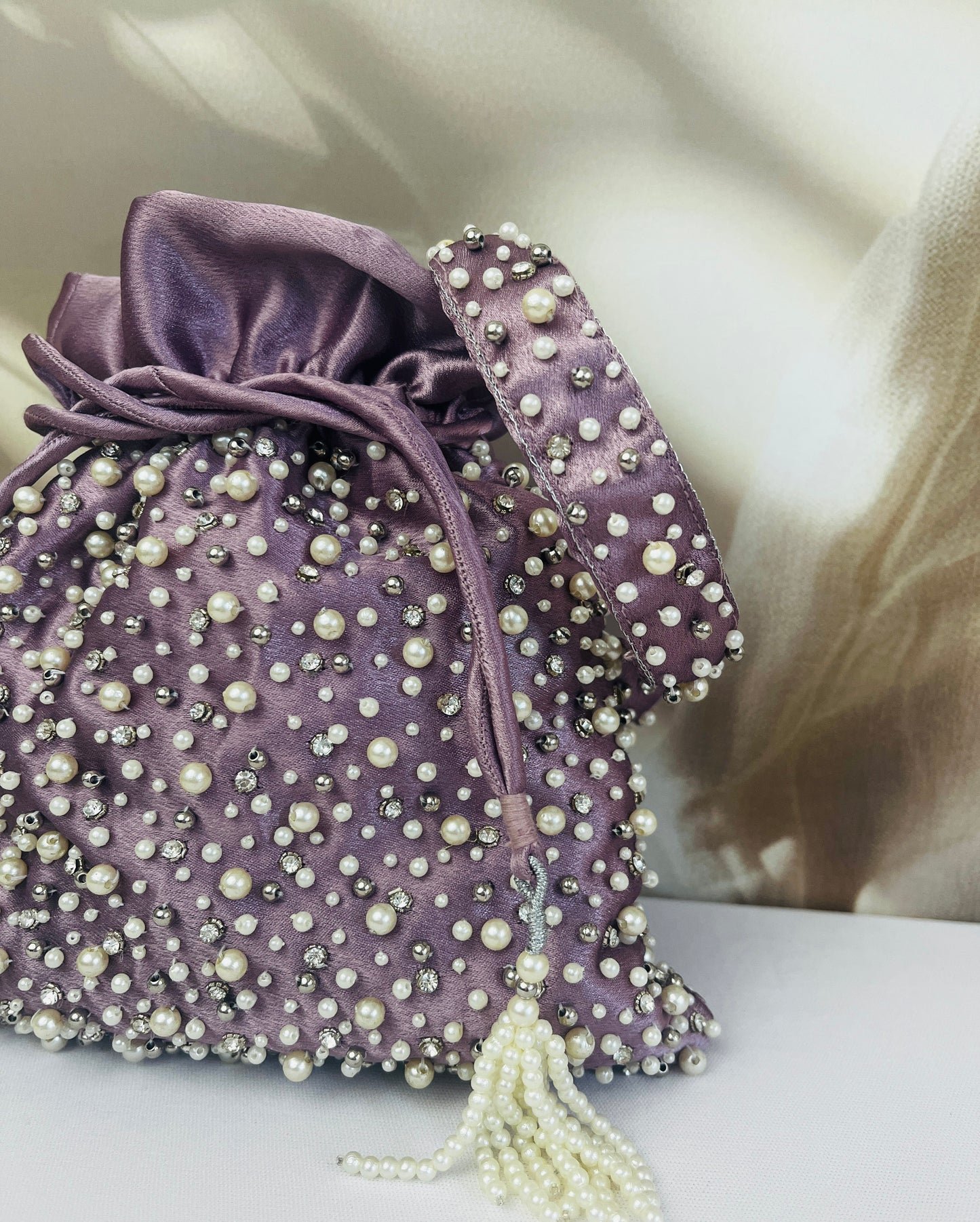 Mukta Purple Pearl Potli Bag