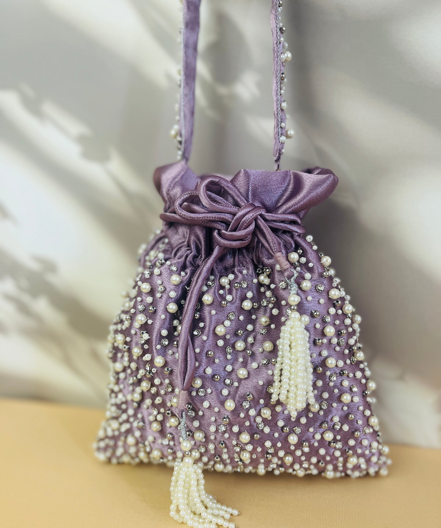 Mukta Purple Pearl Potli Bag