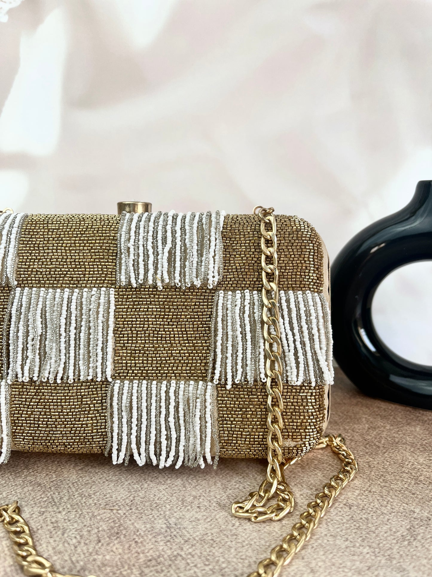 NOVA Pearl Golden Clutch