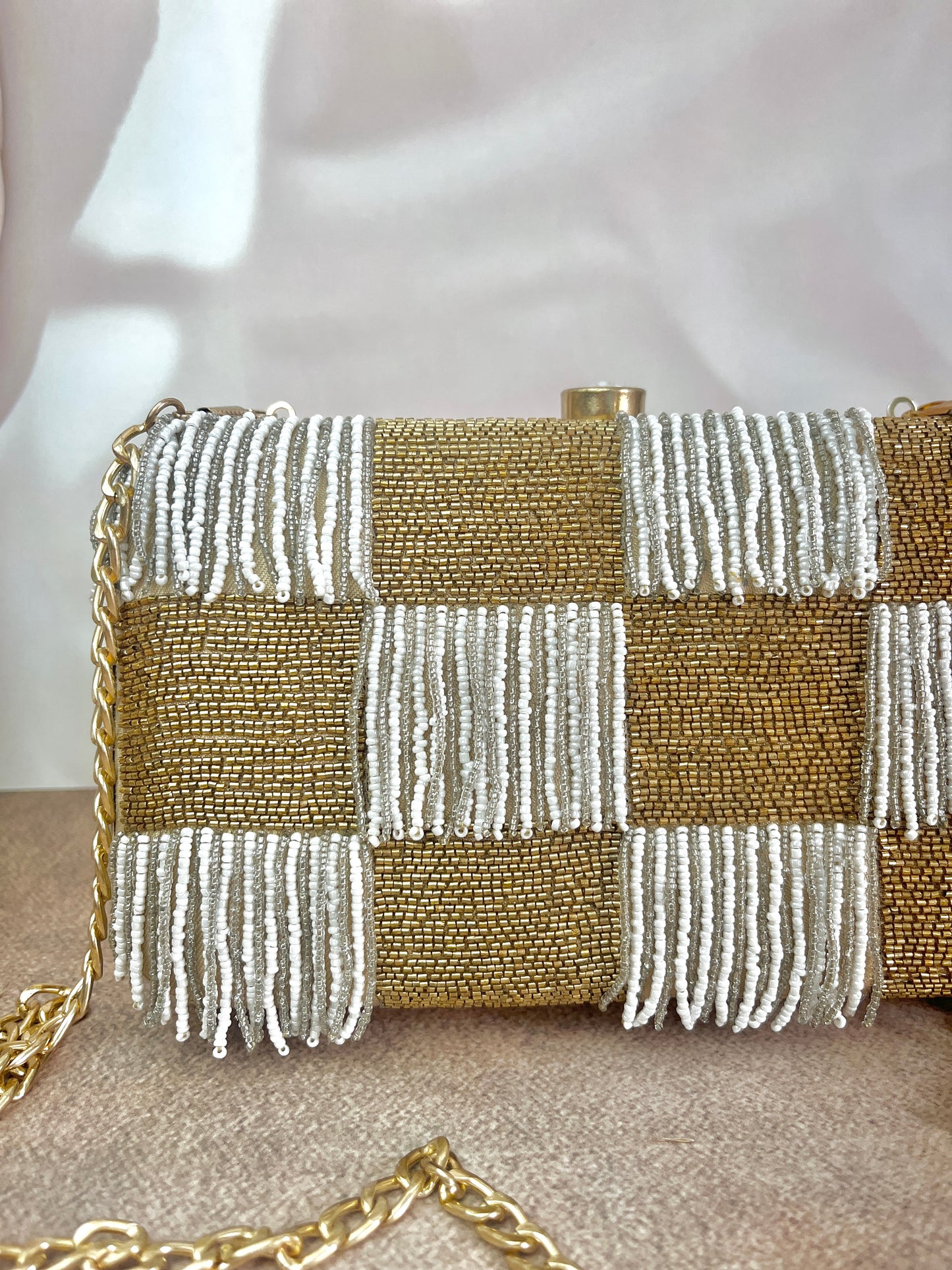 NOVA Pearl Golden Clutch